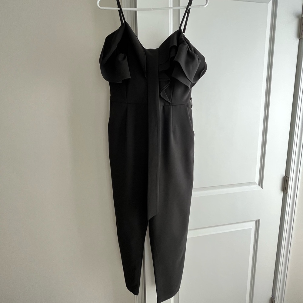 Main Strip jumpsuit size Large. Good condition. Smoke free pet free home.
